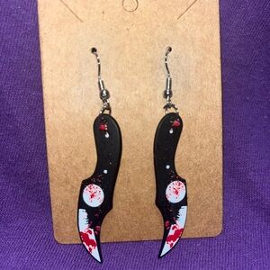 Murder weapon earrings